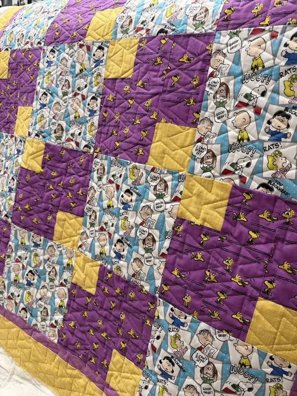Peanuts Snoopy and Woodstock themed quilt