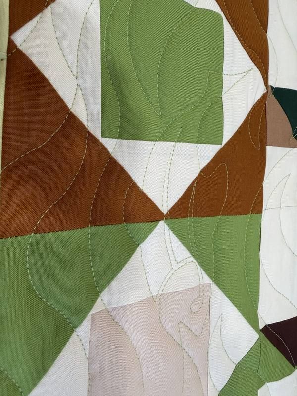 Leaf feather edge-to-edge on modern geometric quilt