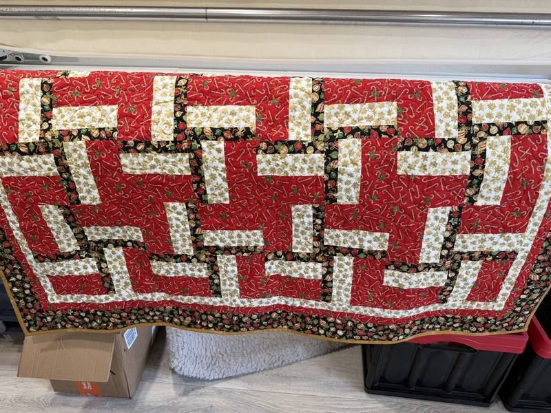 Christmas rail fence quilt in red black and gold